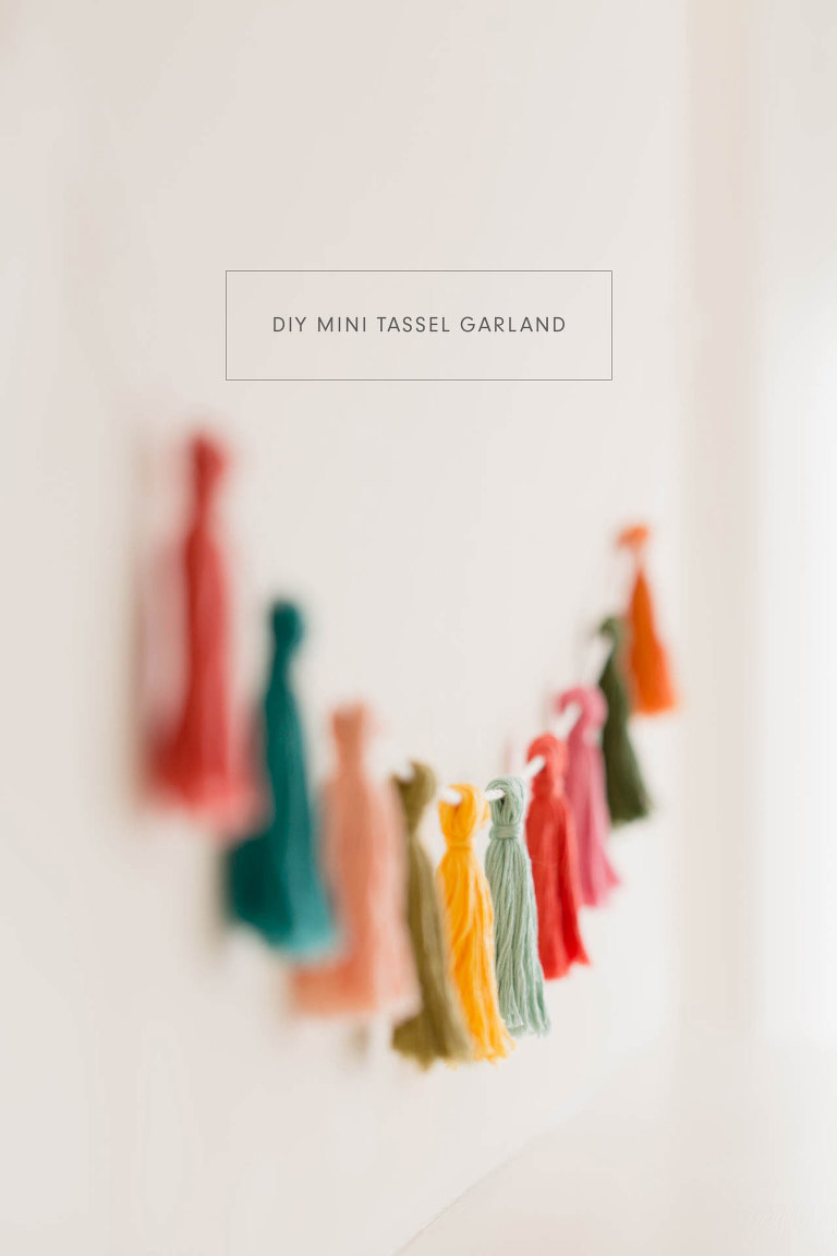 This DIY Mini Tassel Garland is an easy way to add a little color and cheer to any situation!
